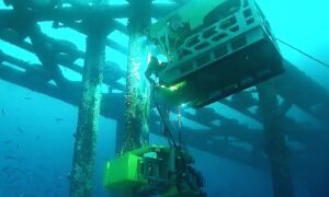 A DeepOcean remotely operated vehicle conducts decommissioning works on the Dunlin Alpha platform.
