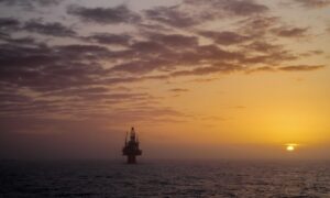 Oil platform at sunset in the North Sea.