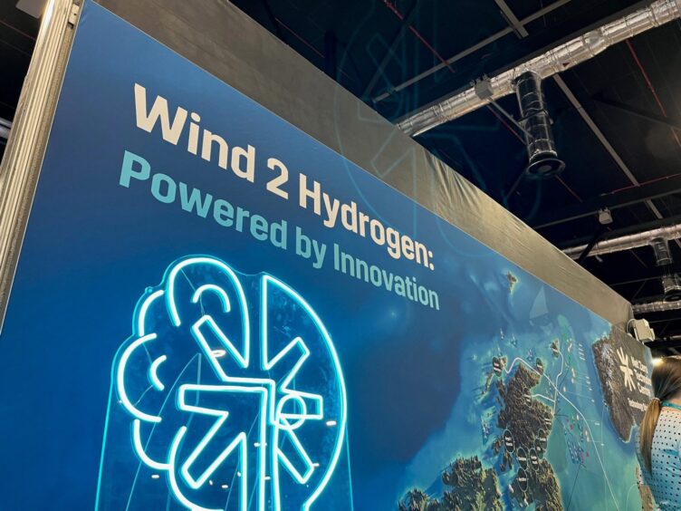 NZTC 'wind to hydrogen' sign at Floating Offshore Wind 2023. PJ Live.