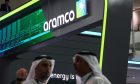 Signage above the Saudi Aramco booth on day two of the Abu Dhabi International Petroleum Exhibition and Conference (ADIPEC) in Abu Dhabi, United Arab Emirates, on Tuesday, Oct. 3, 2023.
