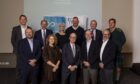 Industry leaders pose together at Connected Competence Summit.