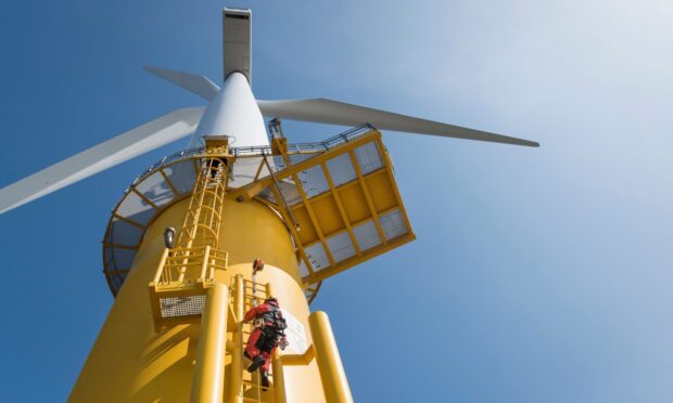 A worker on an offshore wind turbine.