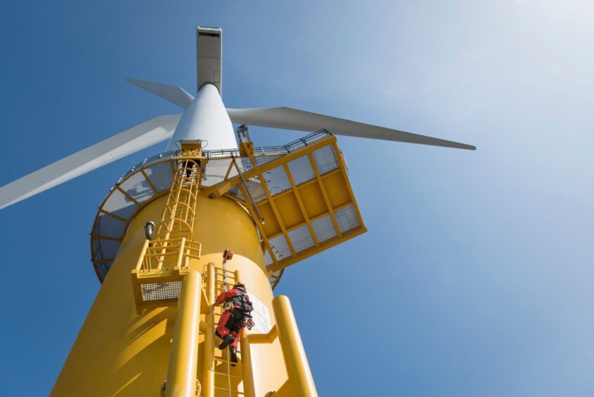 A worker on an offshore wind turbine.