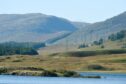 Loch Spey in Badenoch as pylons for the Beauly to Denny power line march over the Corrieyarick Pass between Badenoch and Fort Augustus.