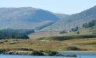 Loch Spey in Badenoch as pylons for the Beauly to Denny power line march over the Corrieyarick Pass between Badenoch and Fort Augustus.