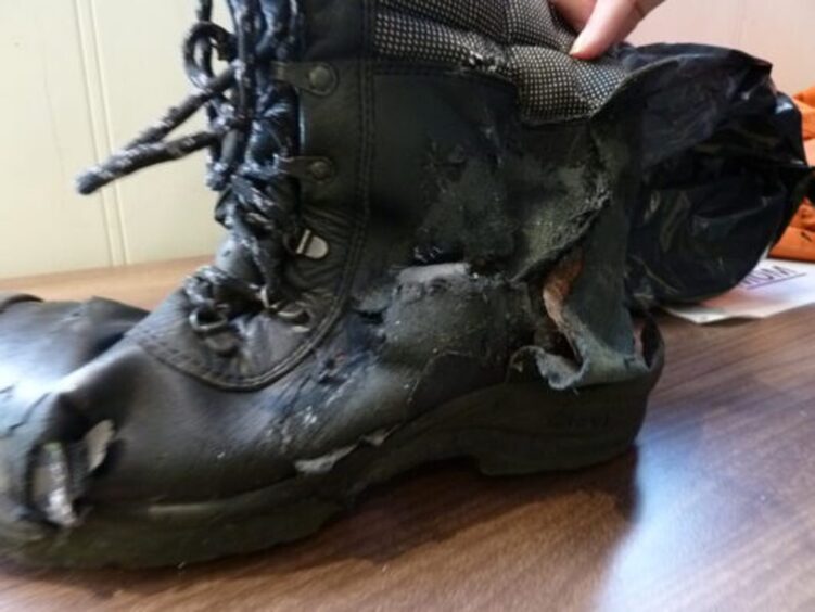 The damaged boot Mr Hill had been wearing at the time of the incident.