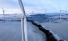 Wind turbines near Kettering, UK, on Wednesday, Dec. 14, 2022. UK power prices for Monday jumped to record levels as freezing temperatures are set to cause a surge in demand, just as a drop in wind generation causes a supply crunch.