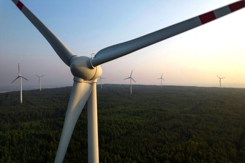 Wind turbines operate at the Kamiensk wind farm, operated by PGE SA, in Kamiensk, Poland, on Thursday, July 8, 2021. PGE, which apart from being the operator of Europe's largest lignite-fired power plant, is also the biggest owner of onshore wind parks in Poland. Photographer: Piotr Malecki/Bloomberg