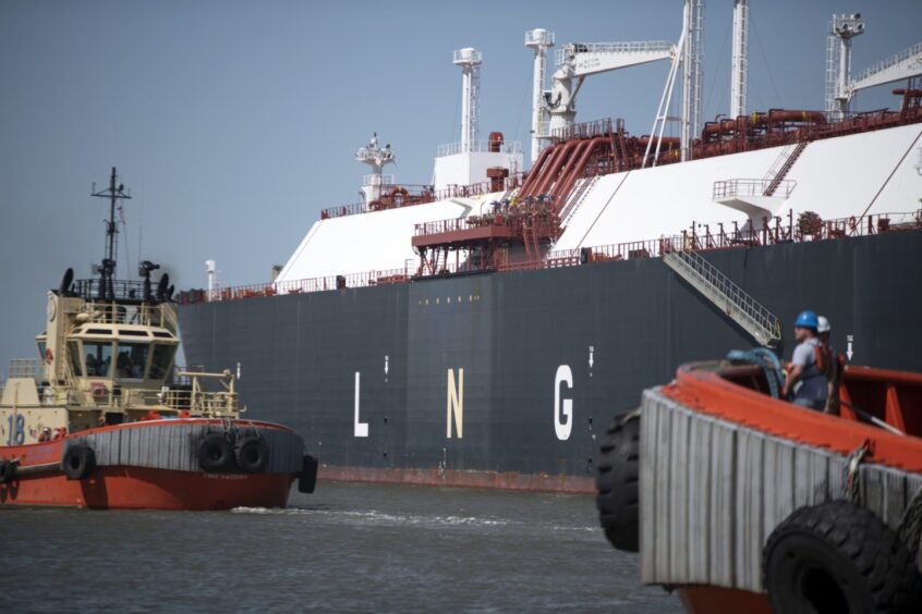 Tug boats prepare to pull out an LNG Tanker vessel at the Cheniere Sabine Pass Liquefaction facility in Cameron, Louisiana, U.S., on Thursday, April 14, 2022. Cheniere Energy, Inc. is the largest producer and exporter of liquefied natural gas (LNG) in the United States and the second-largest LNG operator in the world. Photographer: Mark Felix/Bloomberg
