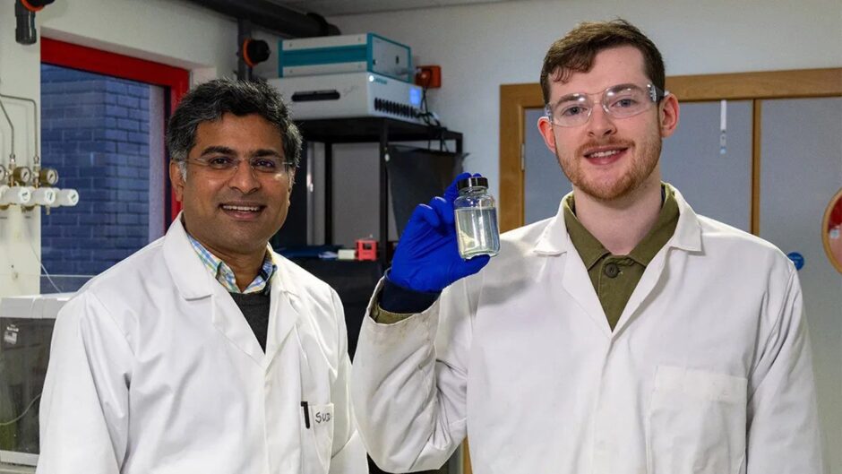 To go with story by Mathew Perry. Researchers develop method to create green hydrogen from distillery wastewater Picture shows; Heriot-Watt materials scientist Dr Sudhagar Pitchaimuthu (left) and PhD student Michael Walsh with a sample of whisky distillery wastewater.. Edinburgh, Scotland. Supplied by Heriot-Watt University Date; Unknown