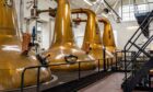 Copper stills used in whisky production.