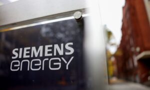 A Siemens Energy AG logo on a sign at the company's gas turbine factory in Berlin, Germany, on Friday, Oct. 27, 2023.