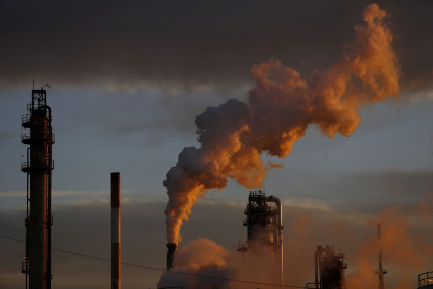 Emissions rise from a refining facility in Ohio, U.S.