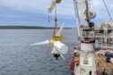 A tidal turbine being deployed in the Pentland Firth as part of the MeyGen Tidal Energy Project.