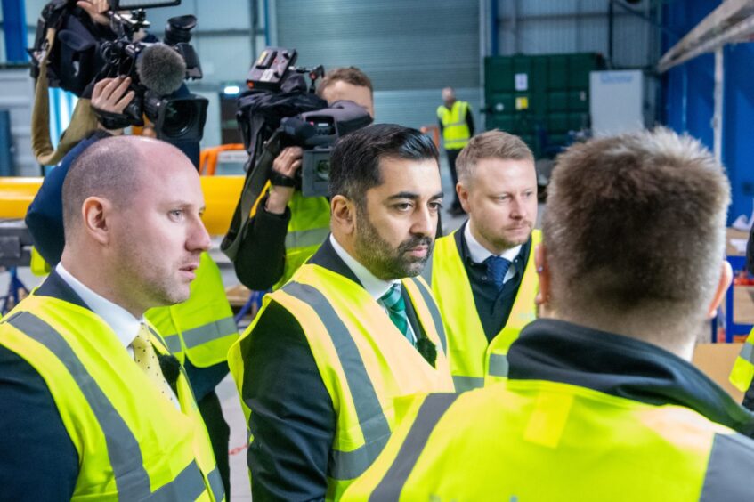 First Minister Humza Yousaf on a tour of the Verlume facility with Neil Gray and Verlume boss Richard Knox (right).