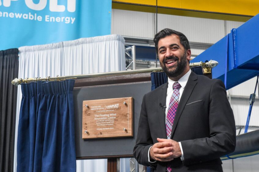 Scottish First Minister Humza Yousaf unveils a plaque at the opening  of the UK's first dedicated innovation centre for floating offshore wind in Aberdeen.