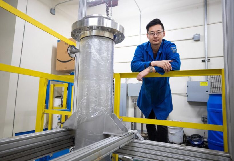 Charles Cai and a pioneering 20-gallon "reactor" for the production of low cost, sustainable biodiesel.