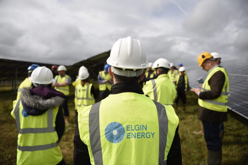Elgin Energy employees at a solar farm development.