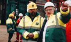 First Minister Humza Yousaf, left, and Harland & Wolff chief executive John Wood at Arnish. Image: Harland & Wolff