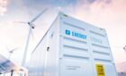 Conceptual image of a modern battery energy storage system with wind turbines and solar panel power plants in background. 3d rendering; Shutterstock ID 1914665077; purchase_order: Energy Voice; job: Energy Voice fasken piece December 2021; e94f422d-ea3d-4006-be77-e58e28c5b62f