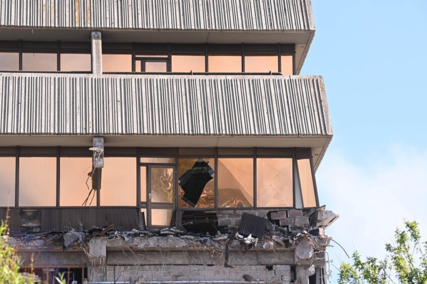 These new images show the latest on the Aberdeen Shell demolition, with the famous gold-tinted glass panels being dismantled.