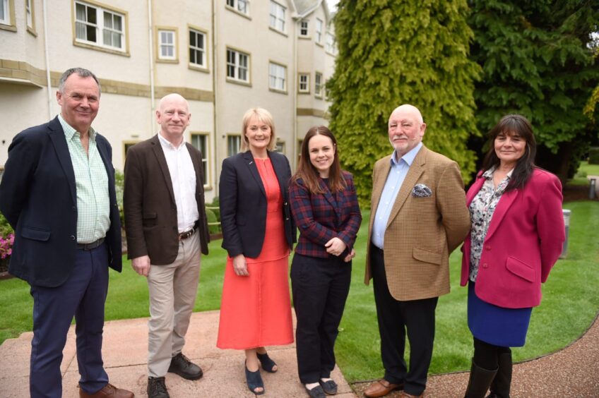 (L-R) Stuart McColm of Cabot Highland, George Baxter of Green power, Yvonne Crook, Deputy First Minister Kate Forbes, Willie Cameron and Samantha Faircliffe of the Cairngorm Brewery