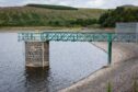 Low water levels at Holl Reservoir in Leslie after long spell of hot summer weather in 2022.