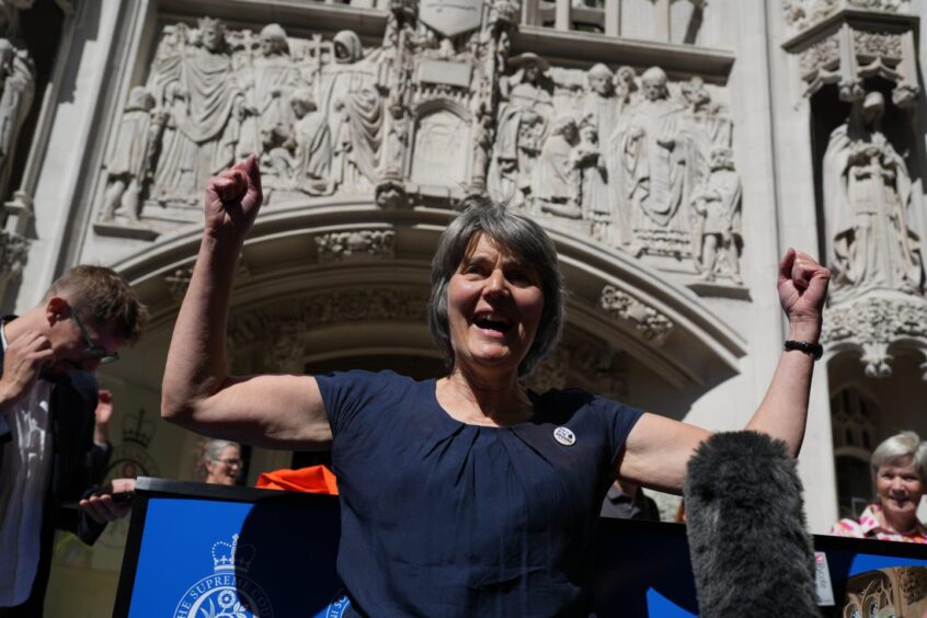 Campaigner Sarah Finch celebrates outside of the Supreme Court in London.