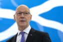 Scottish First Minister and SNP leader John Swinney