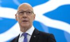 Scottish First Minister and SNP leader John Swinney