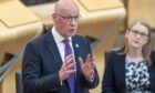First Minister of Scotland John Swinney during First Minister's Questions at the Scottish Parliament in Holyrood, Edinburgh.