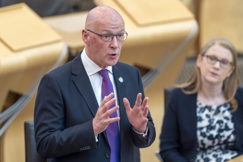 First Minister of Scotland John Swinney during First Minister's Questions at the Scottish Parliament in Holyrood, Edinburgh.