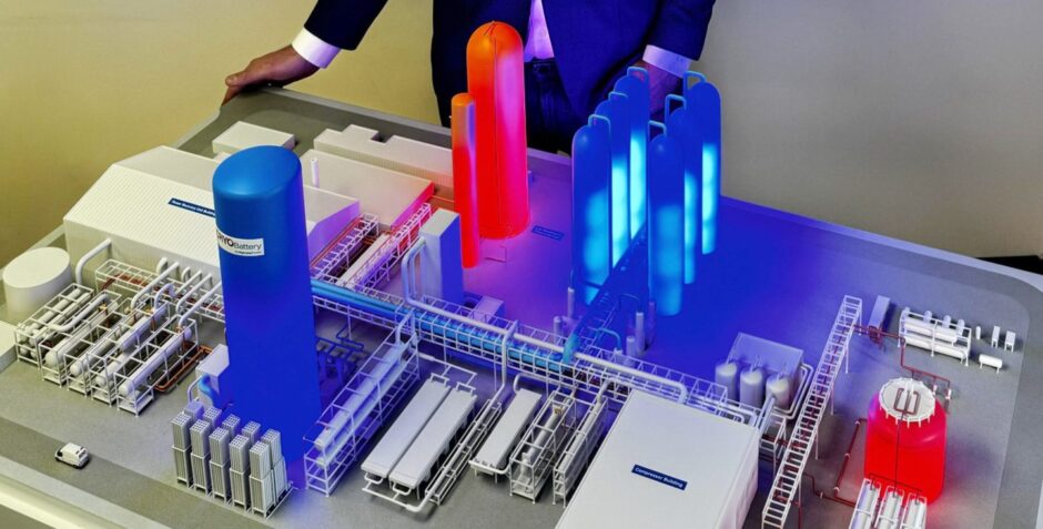 Richard Butland, Co-Founder and CEO of Highview Power with a model of the company's proposed liquid air energy storage plant.