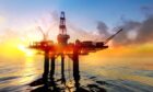 offshore oil rig in sunset