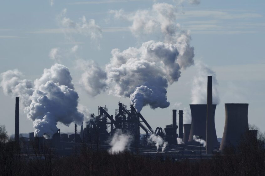 Emissions from chimneys at the British Steel Ltd. plant in Scunthorpe, UK, on Monday, March, 27, 2023. British Steel has proposed closing its coke ovens in a bid to overcome global economic challenges and build a green and sustainable future. Photographer: Dominic Lipsinski/Bloomberg