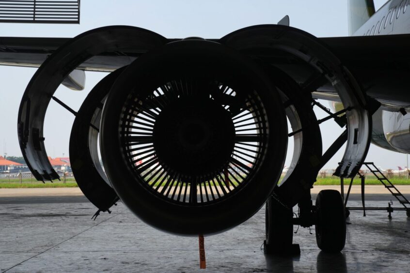 A PT Garuda Indonesia aircraft undergoes maintenance at the company's facility at Soekarno-Hatta International Airport in Cengkareng, Indonesia, on Thursday, June 30, 2022.