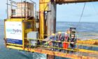 Teams from Ocean Kinetics and Green Marine UK decommissioning Open Hydro's a tidal energy platform in the Orkney Islands.