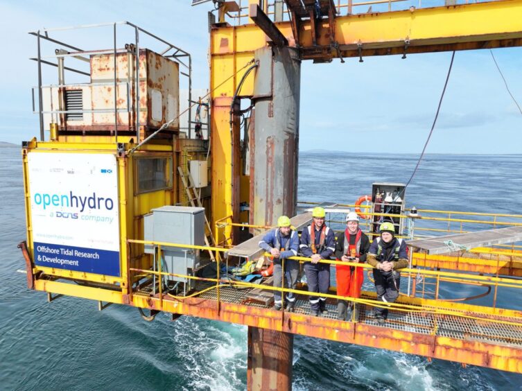 Teams from Ocean Kinetics and Green Marine UK decommissioning Open Hydro's a tidal energy platform in the Orkney Islands.