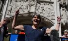 Campaigner Sarah Finch celebrates outside of the Supreme Court in London.