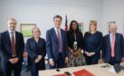 Labour frontbench energy team including Ed Miliband and Sarah Jones.