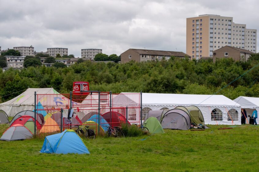 Tents are set up ahead of a weekend of activism at Climate Camp Scotland in Aberdeen