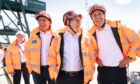(Right to left) Shadow secretary of state for energy security and net zero Ed Miliband, Labour Party leader Sir Keir Starmer and Scottish Labour leader Anas Sarwar at the Port of Greenock while on the General Election campaign trail. Picture date: Friday May 31, 2024.
