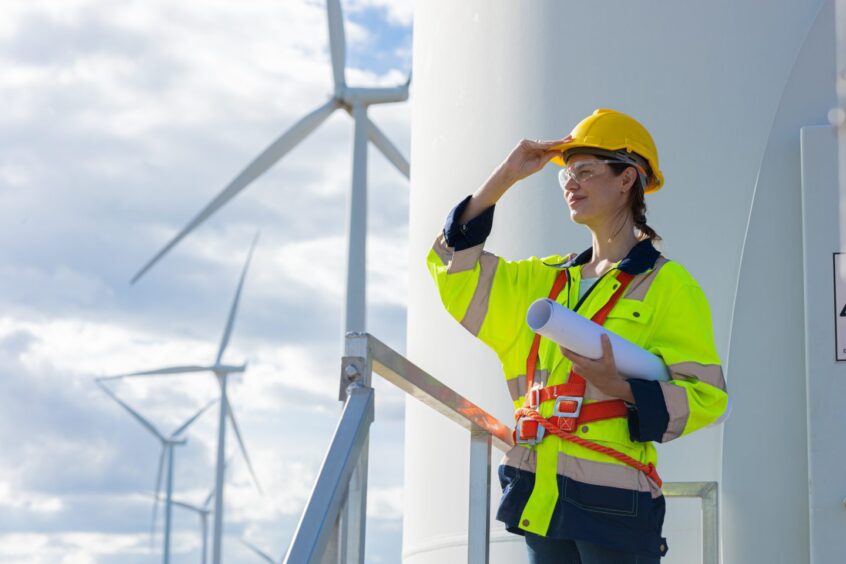 female engineer at a wind farm