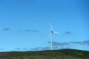 A wind turbine on a hill