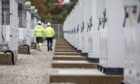 EDF Renewables employees at a battery energy storage facility.