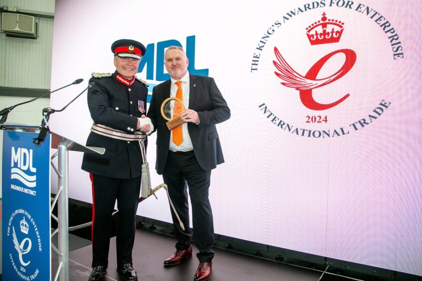 Lord-Lieutenant for Aberdeenshire Alexander (Sandy) Manson presents Derek Smith CEO of Maritime Developments ltd (MDL) with with a King?s Award for Enterprise in the International Trade 