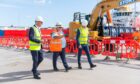 Shore Power in Operation partners with civil sub-contractor at Aberdeen North Harbour (from left to right) Bob Sanguinetti, Port of Aberdeen; Brian Gilchrist, Story Contracting; and Peter Selway, PowerCon..