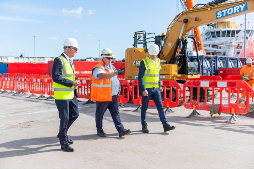 Shore Power in Operation partners with civil sub-contractor at Aberdeen North Harbour (from left to right) Bob Sanguinetti, Port of Aberdeen; Brian Gilchrist, Story Contracting; and Peter Selway, PowerCon..