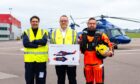 Search and Rescue flight manager David Punchard, OHSUK managing director Andy Rodden, Search and Rescue paramedic and winchman Andrew Cowx.