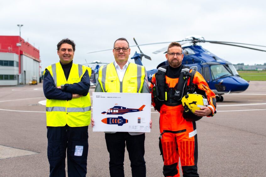 Search and Rescue flight manager David Punchard, OHSUK managing director Andy Rodden, Search and Rescue paramedic and winchman Andrew Cowx.